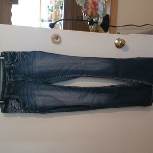 Junior jeans.  Faded look.  Pocket designs.  Boot cut